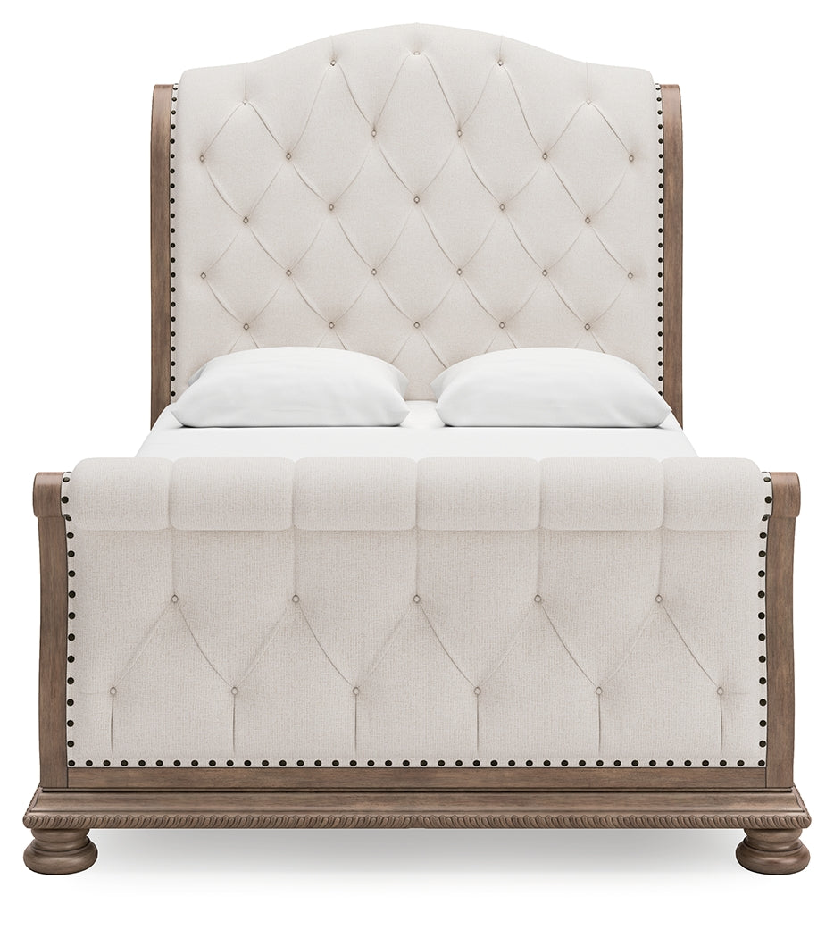 Ardenfield Light Queen Upholstered Sleigh Bed, Dresser and Mirror, Brown