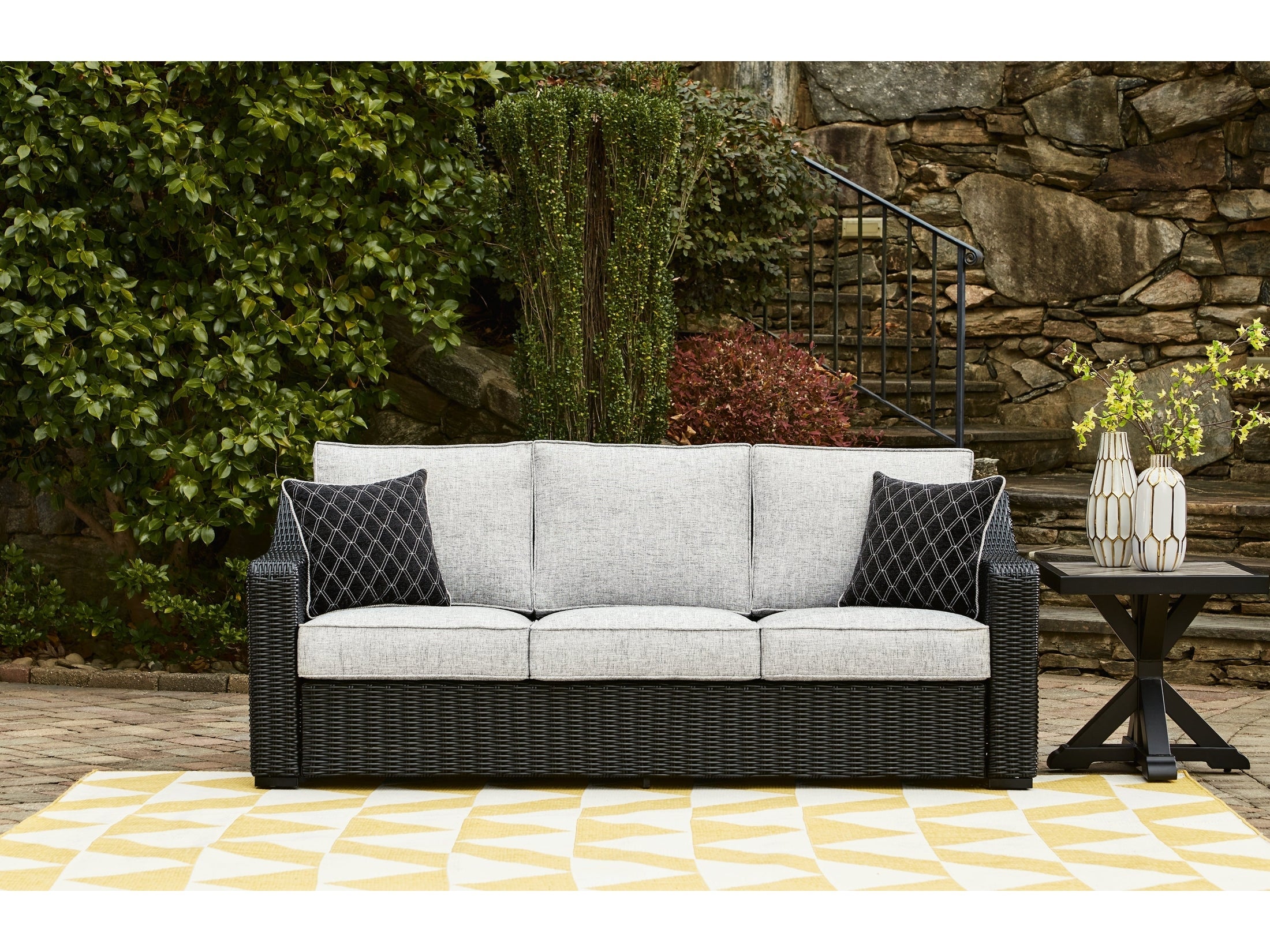 Beachcroft Black/Light Gray Outdoor Sofa with Cushion