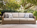 Beachcroft New Beige Outdoor Raf/Laf Loveseat with Cushion (Set of 2)