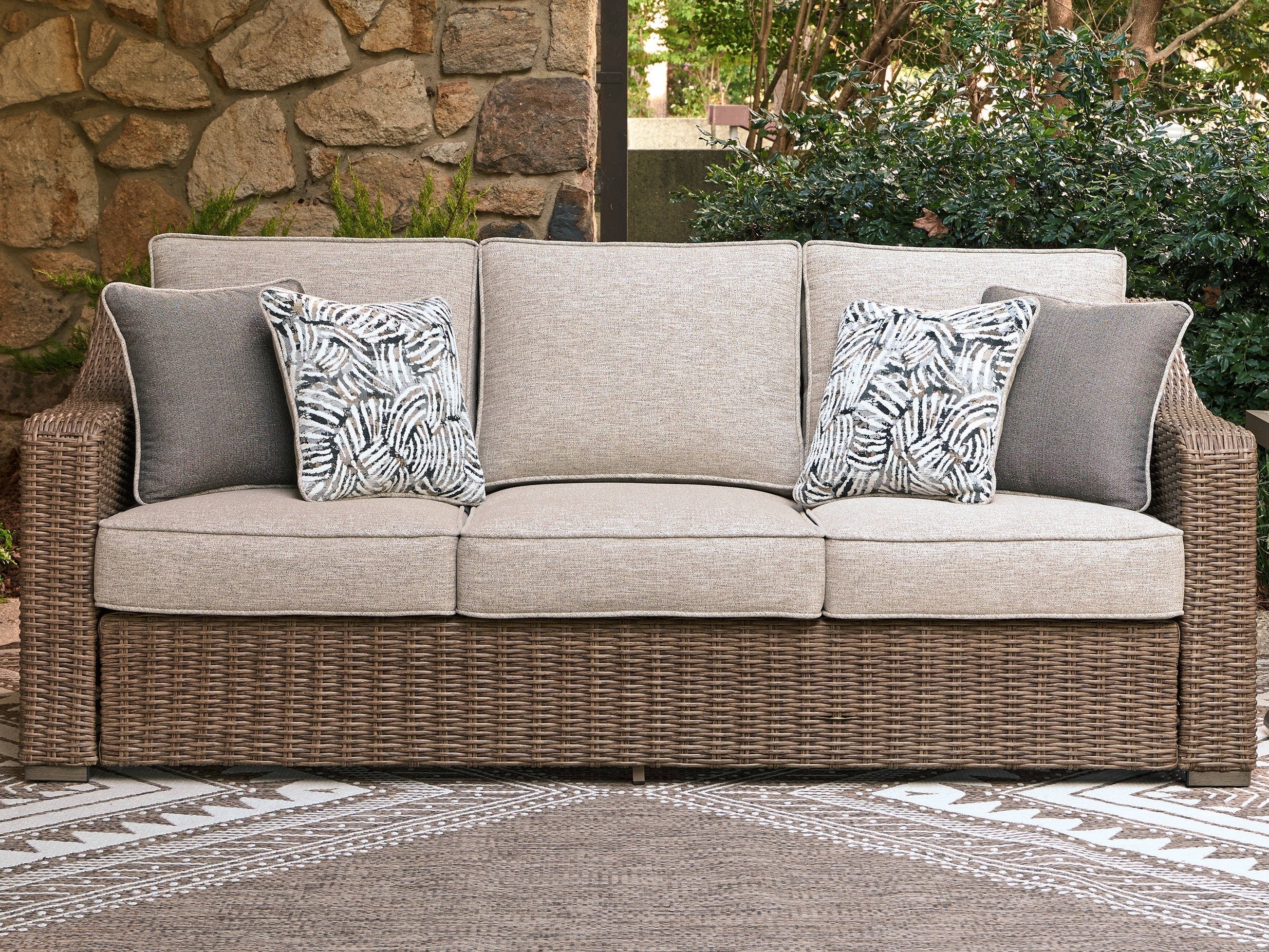 Beachcroft New Beige Outdoor Sofa with Cushion