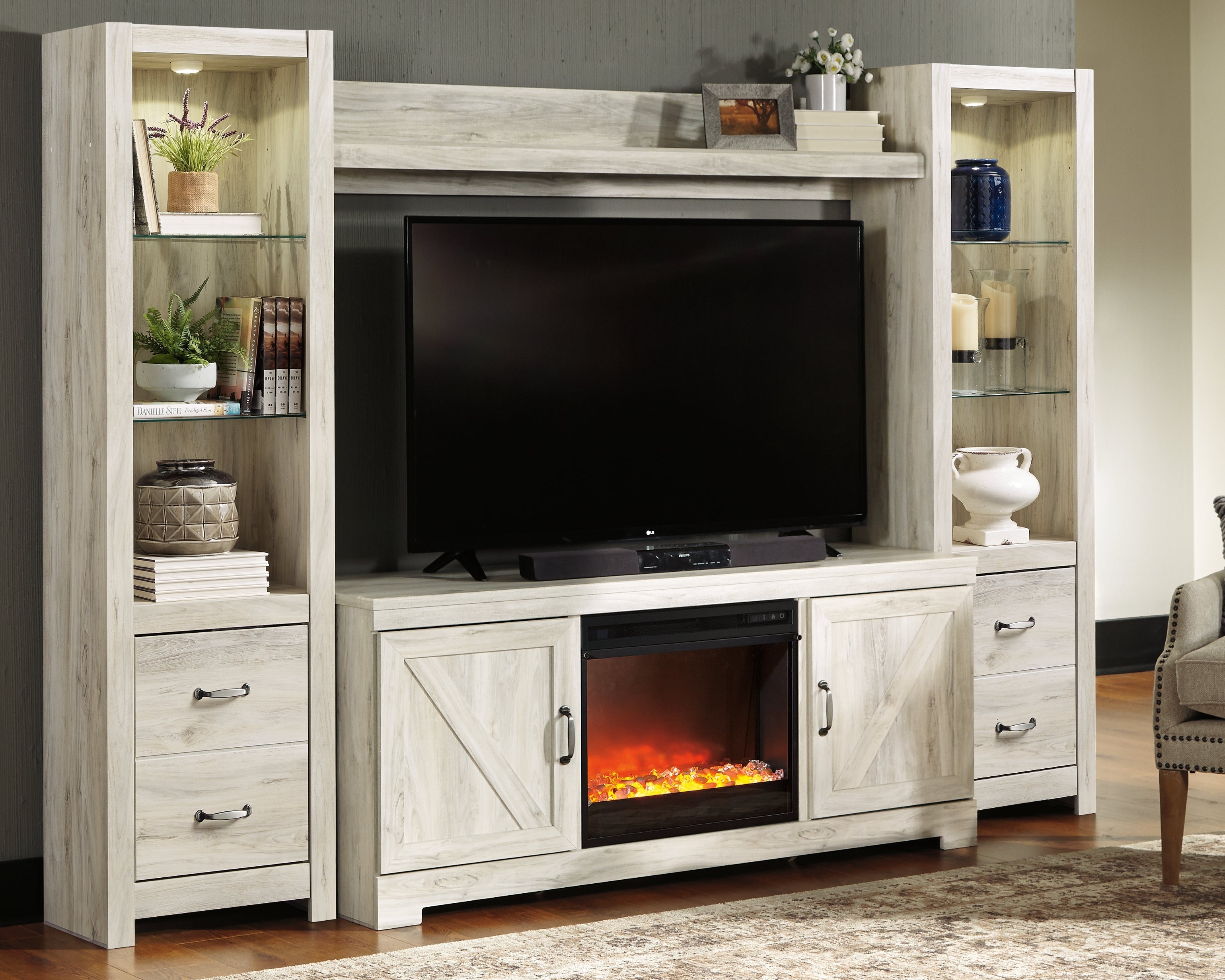 Bellaby Black 4-Piece Entertainment Center with Fireplace