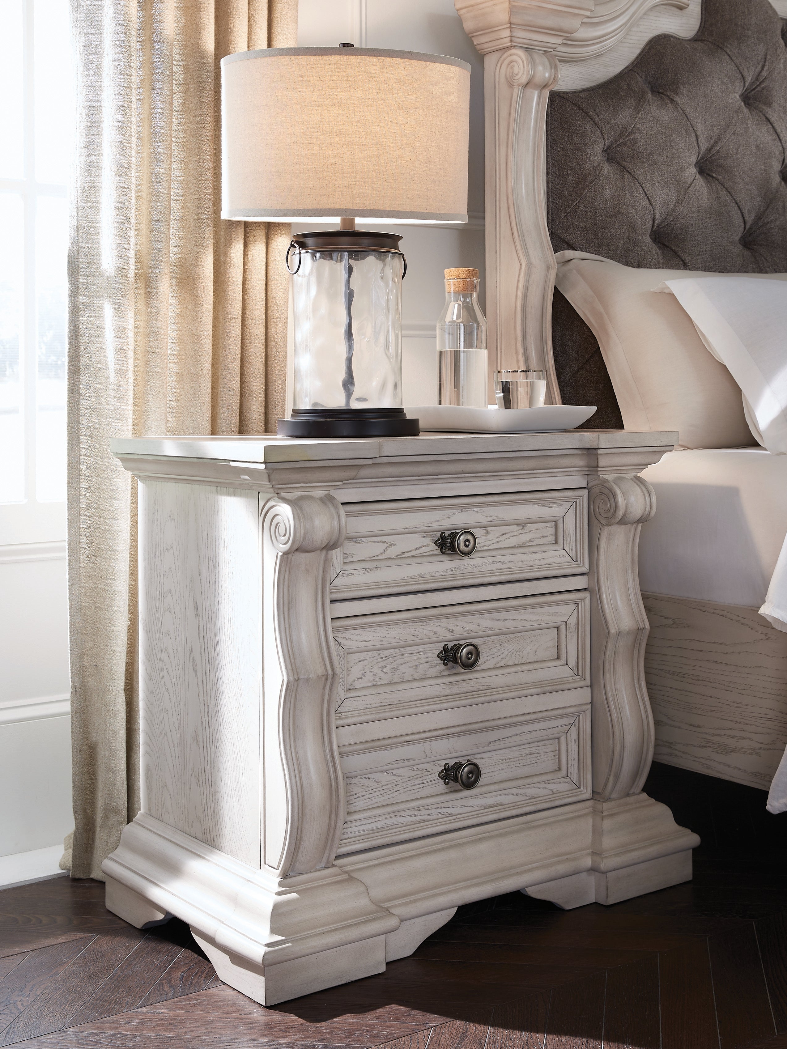Bruchandi Antique White Three Drawer Night Stand