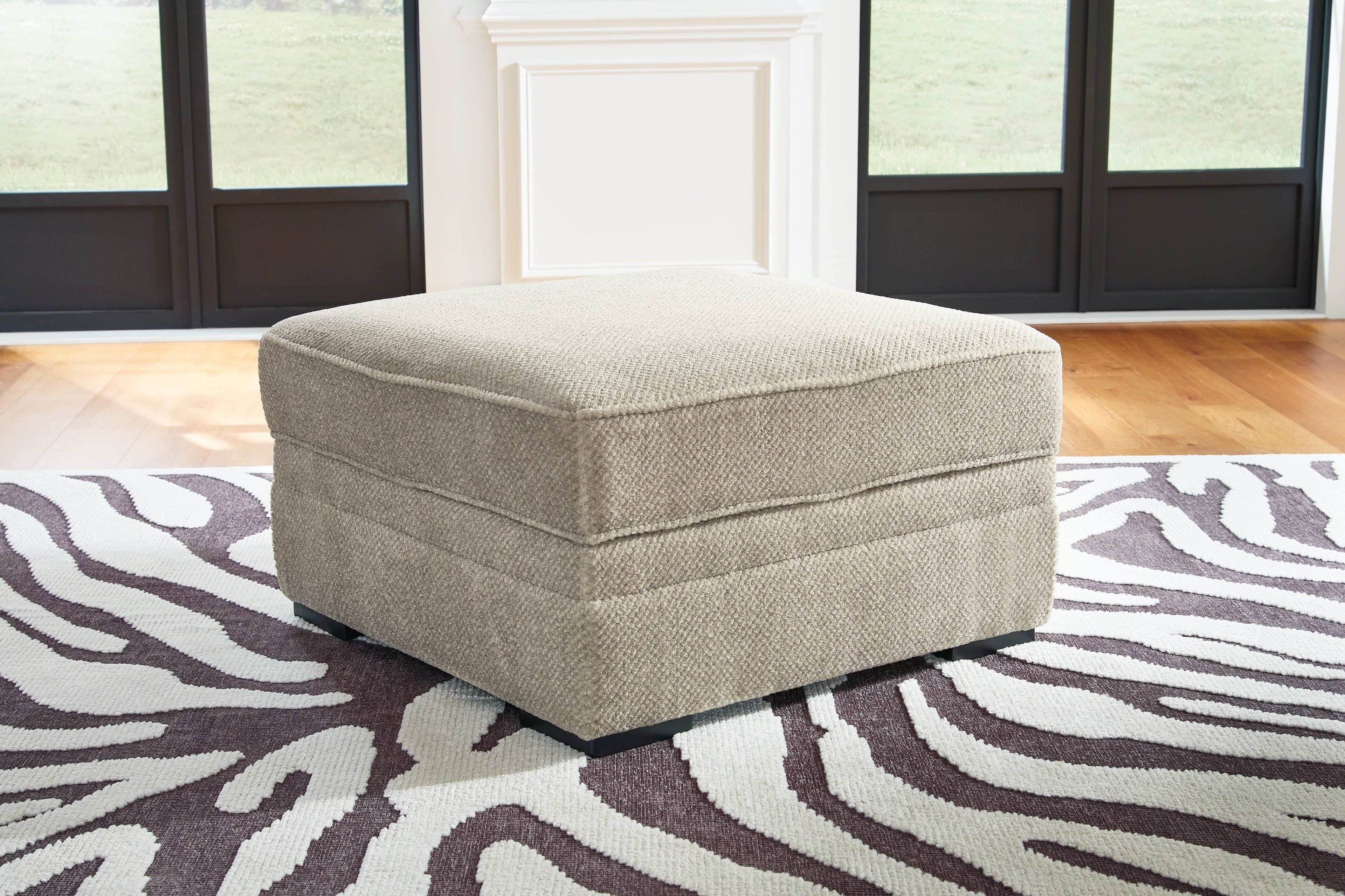 Calnita Sisal Oversized Swivel Chair and Ottoman