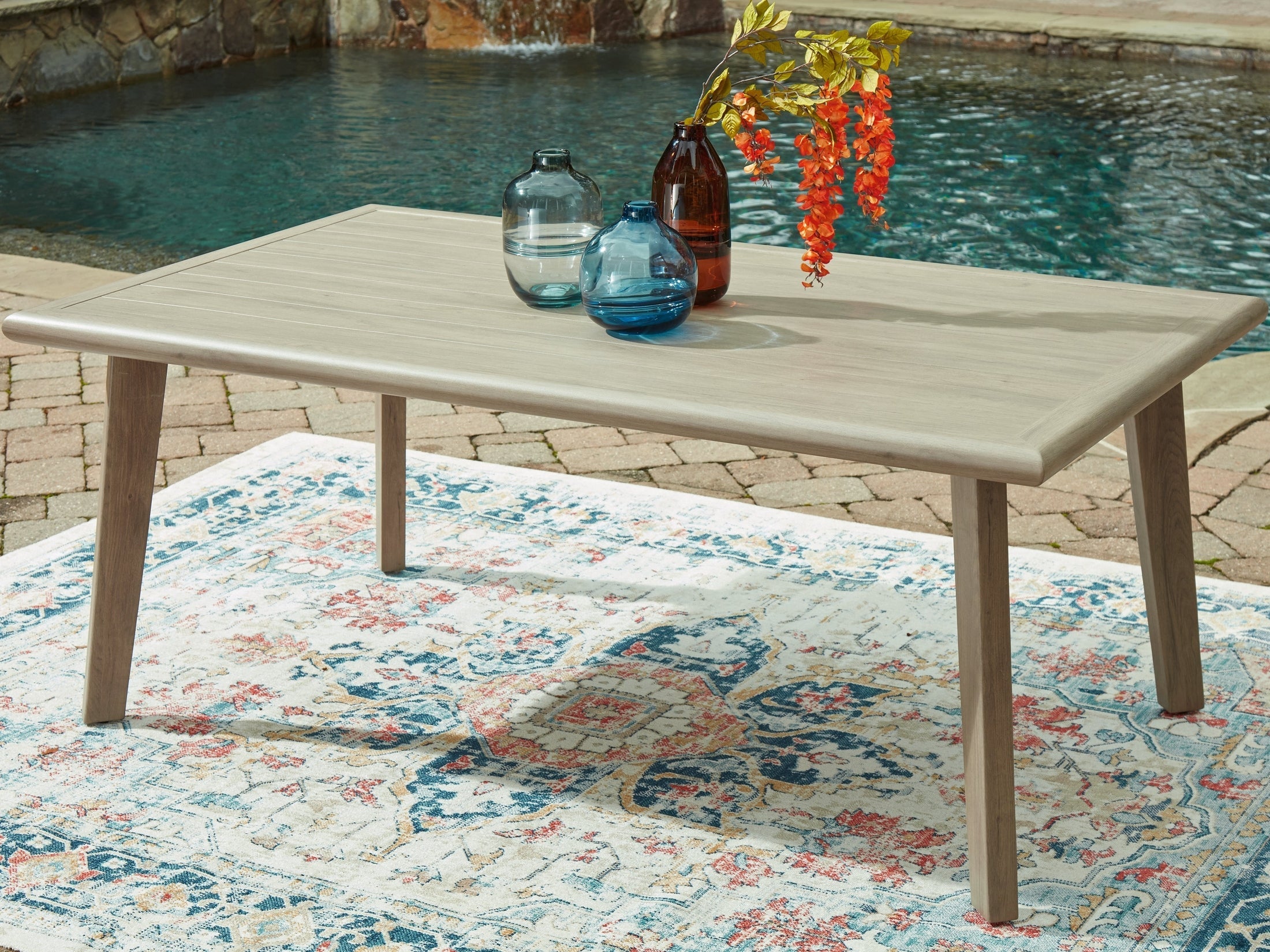 Carisbo Beige Outdoor Dining Table