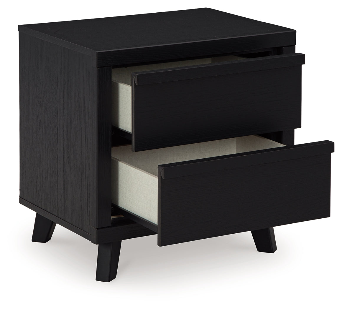 Danziar Black Queen Panel Bedroom Set with Chest and Nightstand