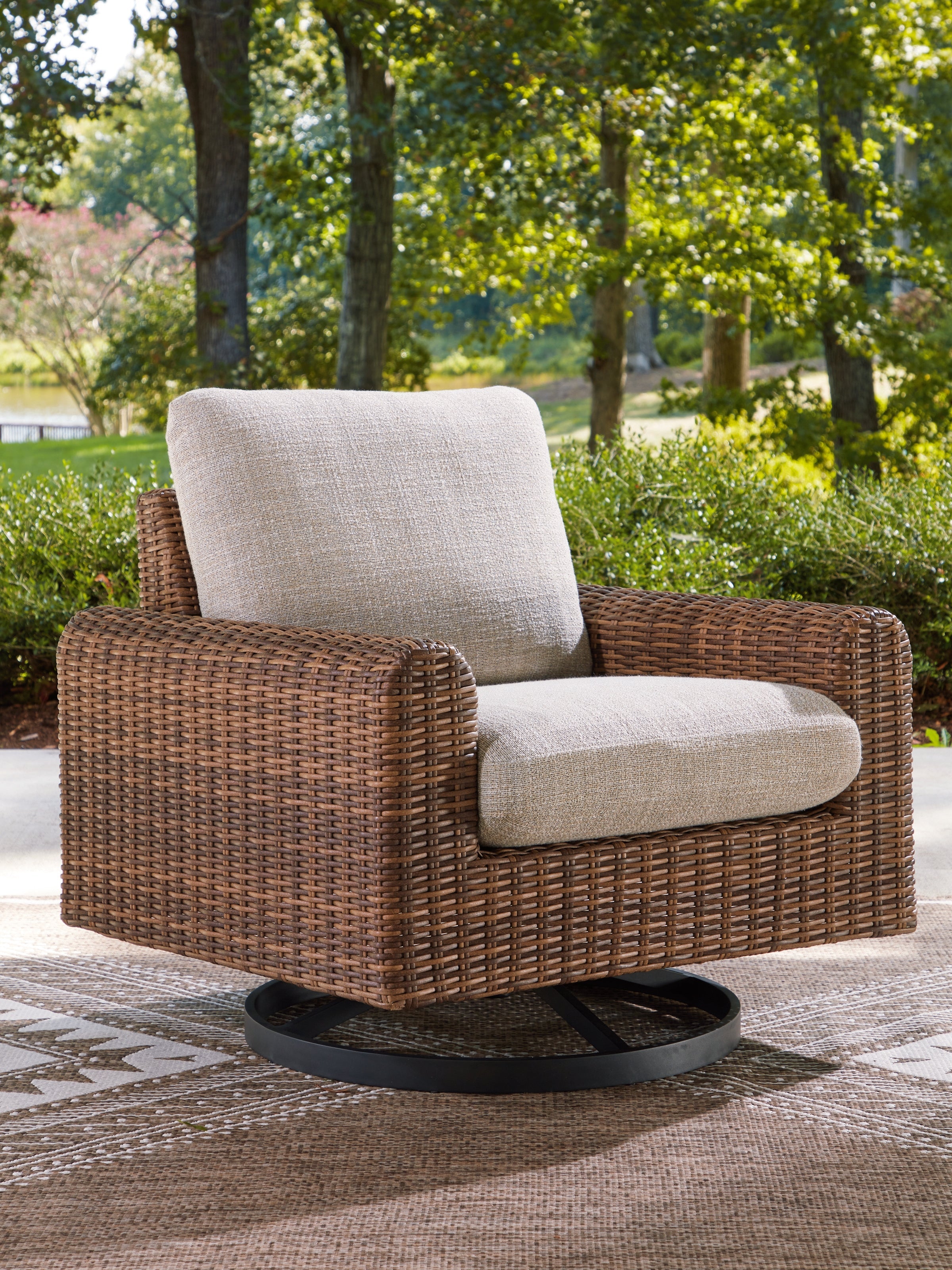 Dolan Creek Gray/Brown Swivel Lounge w/ Cushion