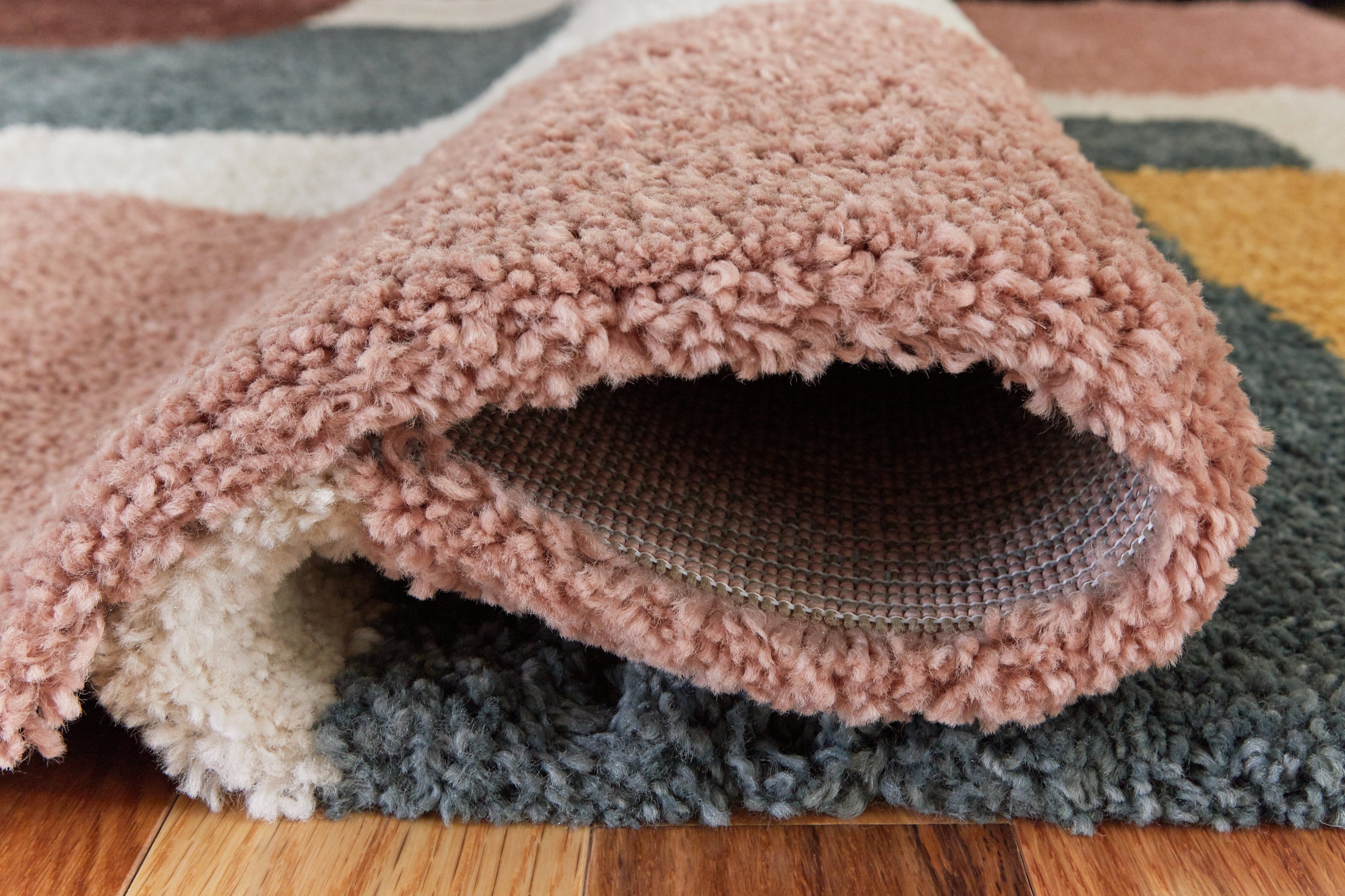 Flynnwick Cream/Pink/Gray 5' x 7' Rug