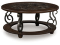 Frallyn Dark Brown Round Cocktail Table