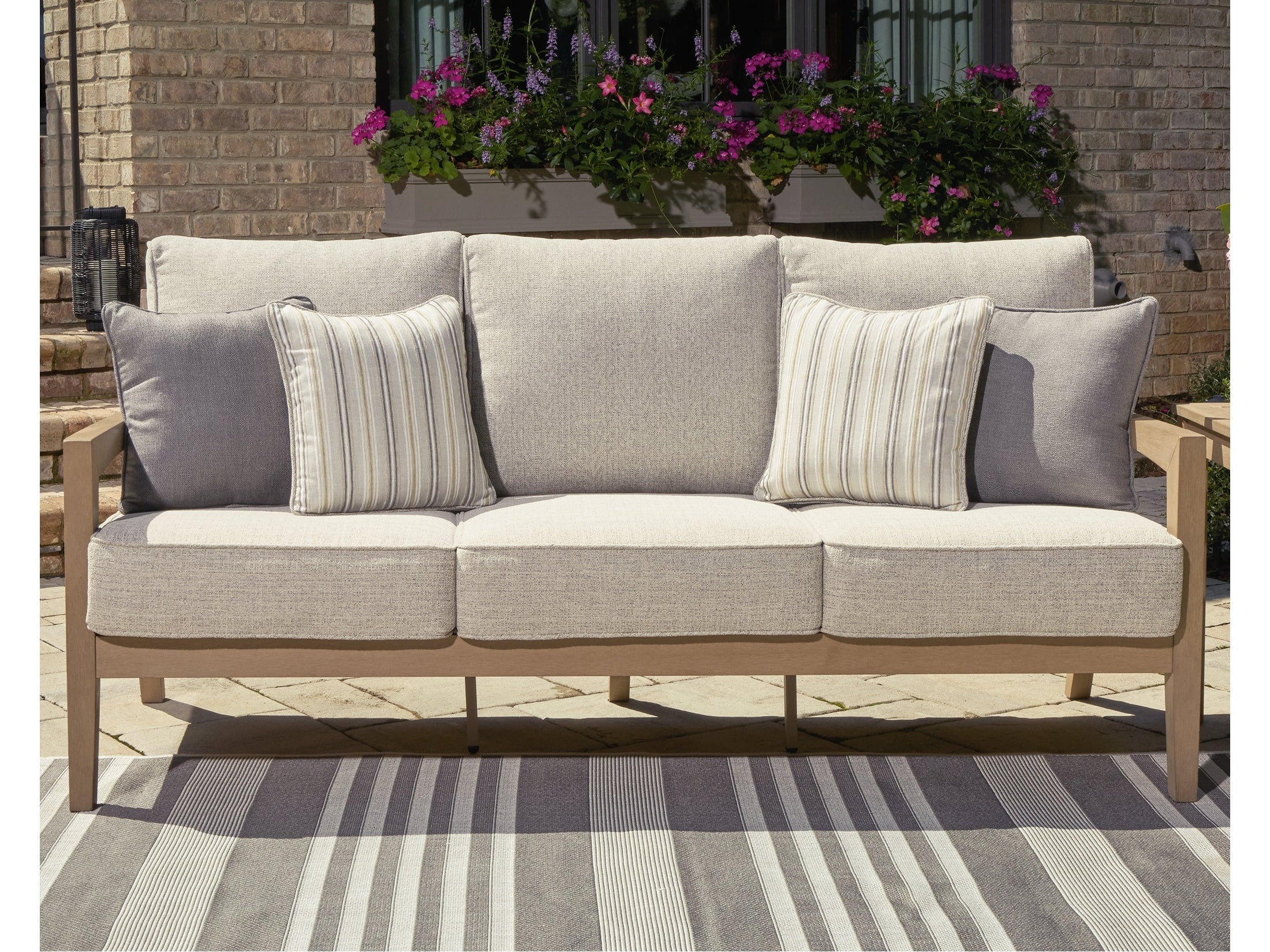 Hallow Creek Driftwood Outdoor Sofa with Cushion