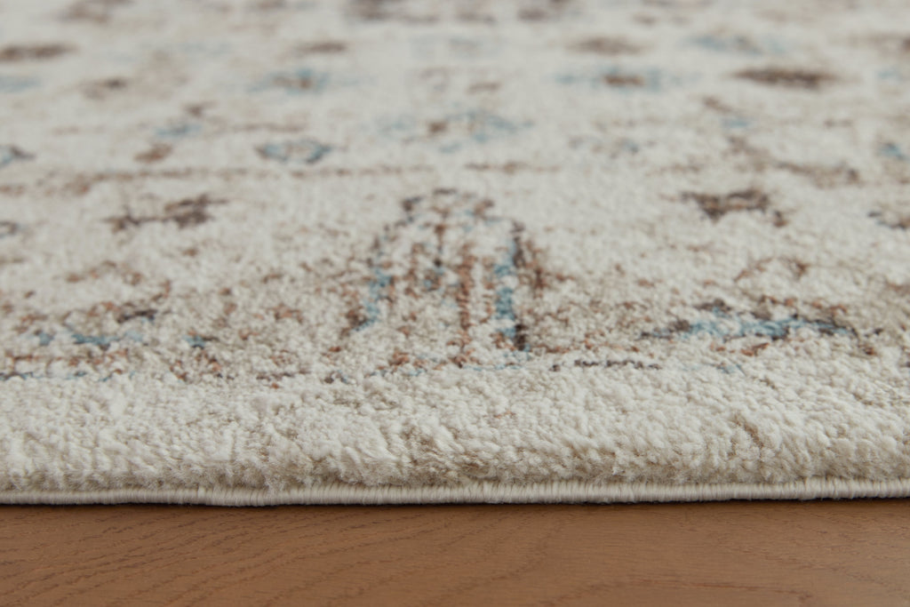 Jossler Ivory/Brown/Teal 5' x 7' Rug