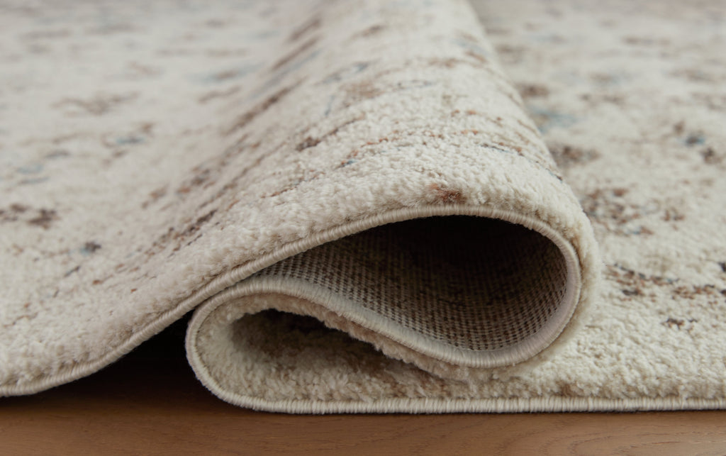 Jossler Ivory/Brown/Teal 8' x 10' Rug