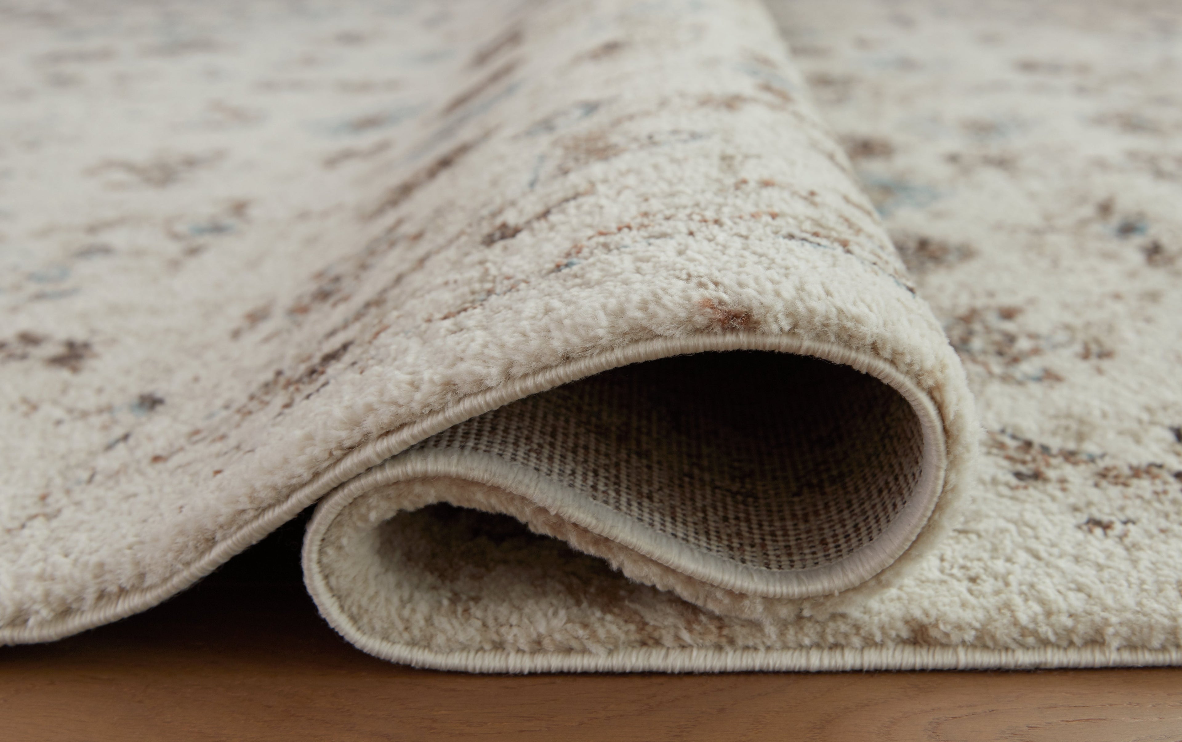 Jossler Ivory/Brown/Teal 8' x 10' Rug