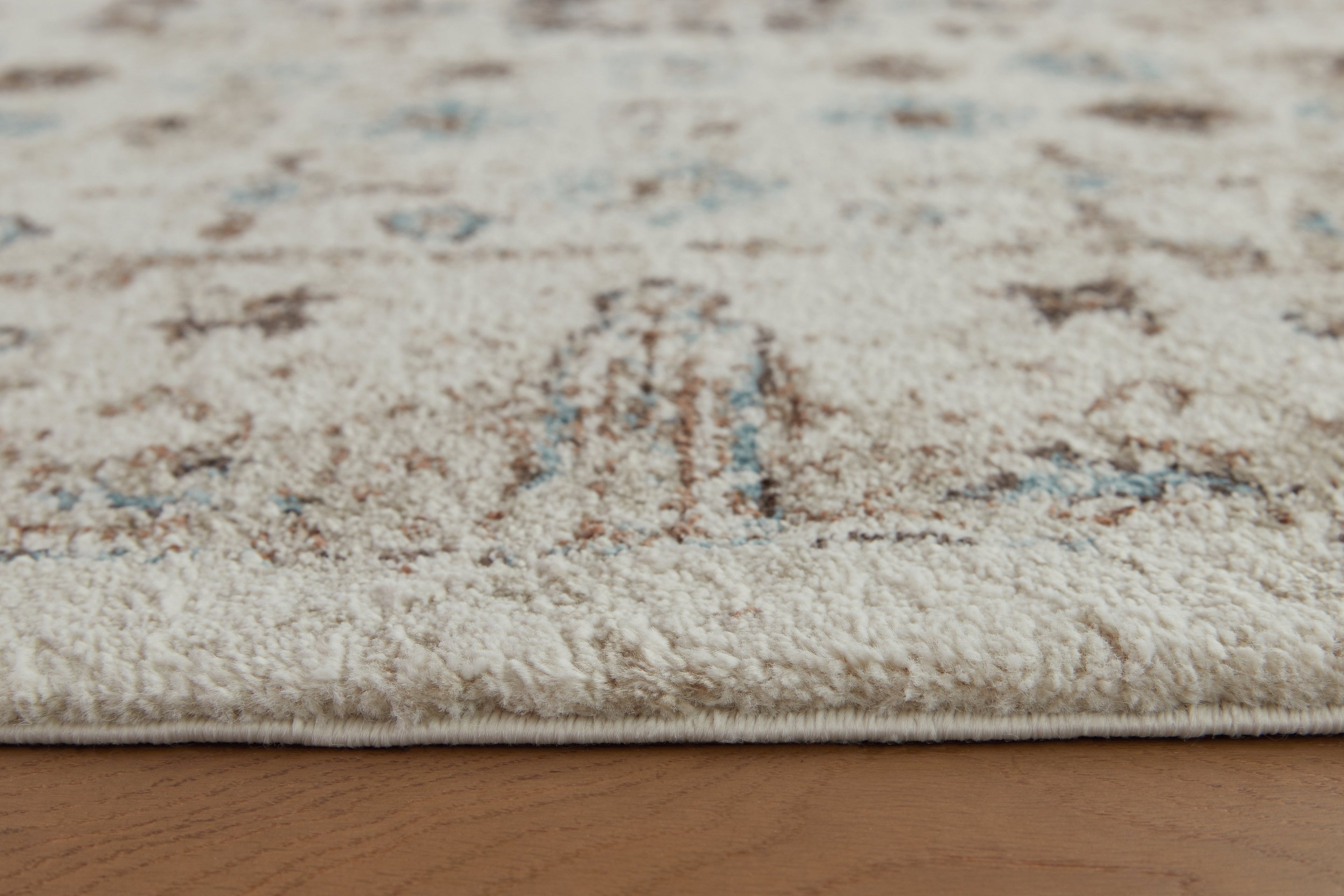 Jossler Ivory/Brown/Teal 8' x 10' Rug