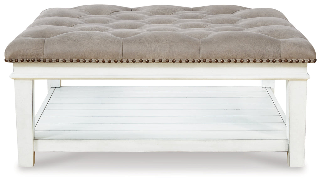 Kanwyn Whitewash Upholstered Ottoman Coffee Table