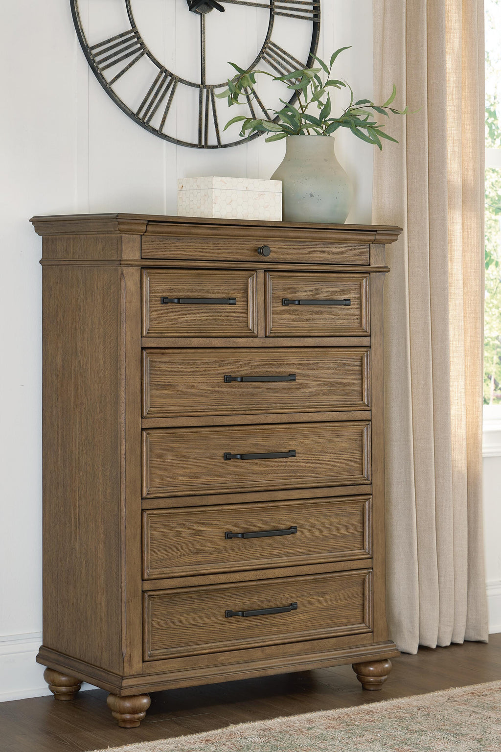 Karallin Medium Brown Chest of Drawers