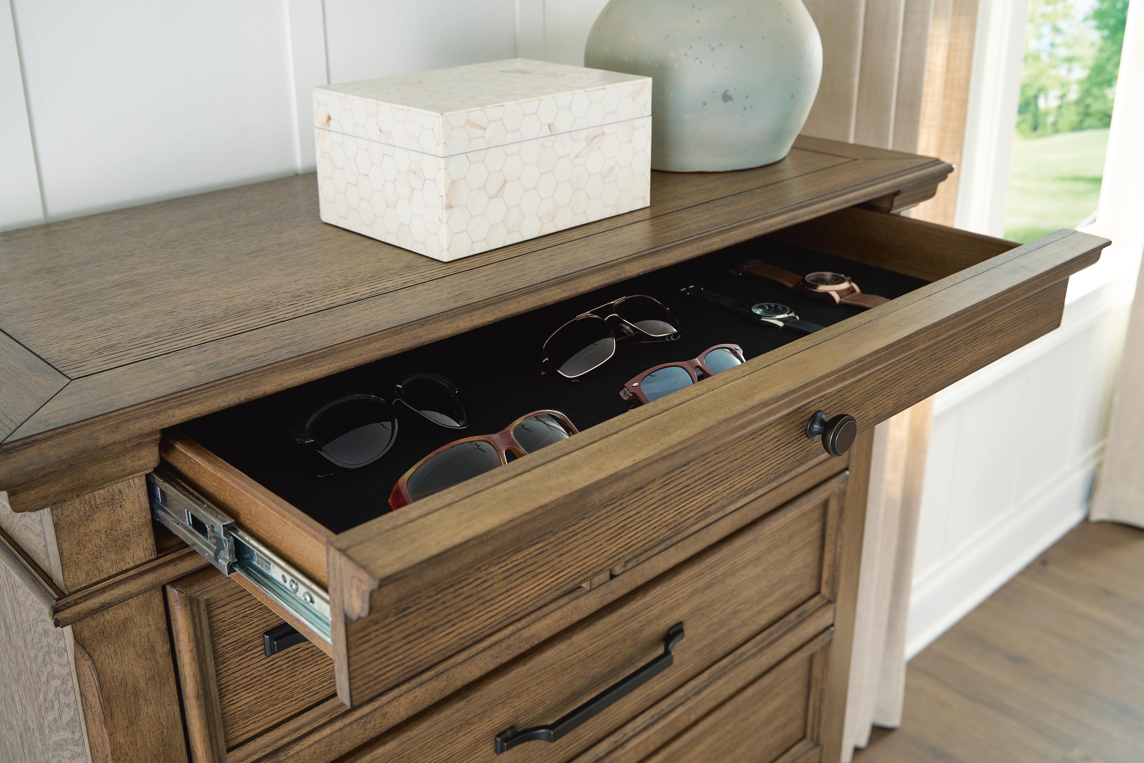 Karallin Medium Brown Chest of Drawers