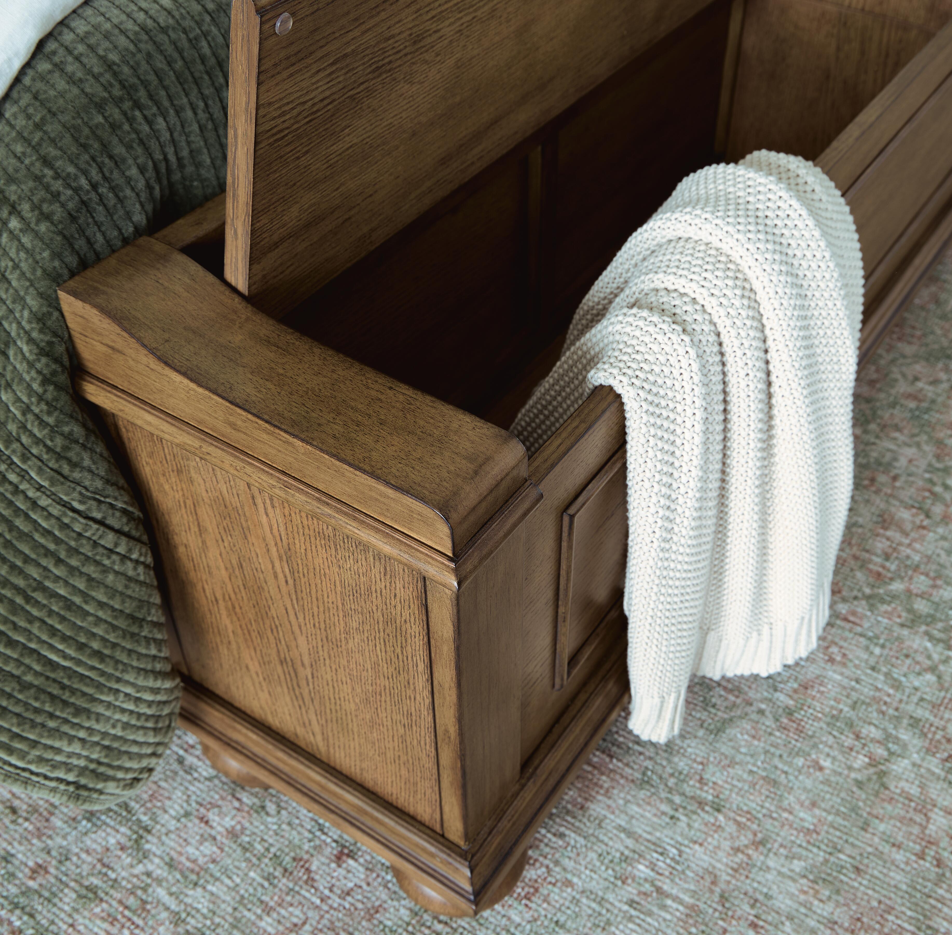 Karallin Medium Brown King Panel Storage Bed