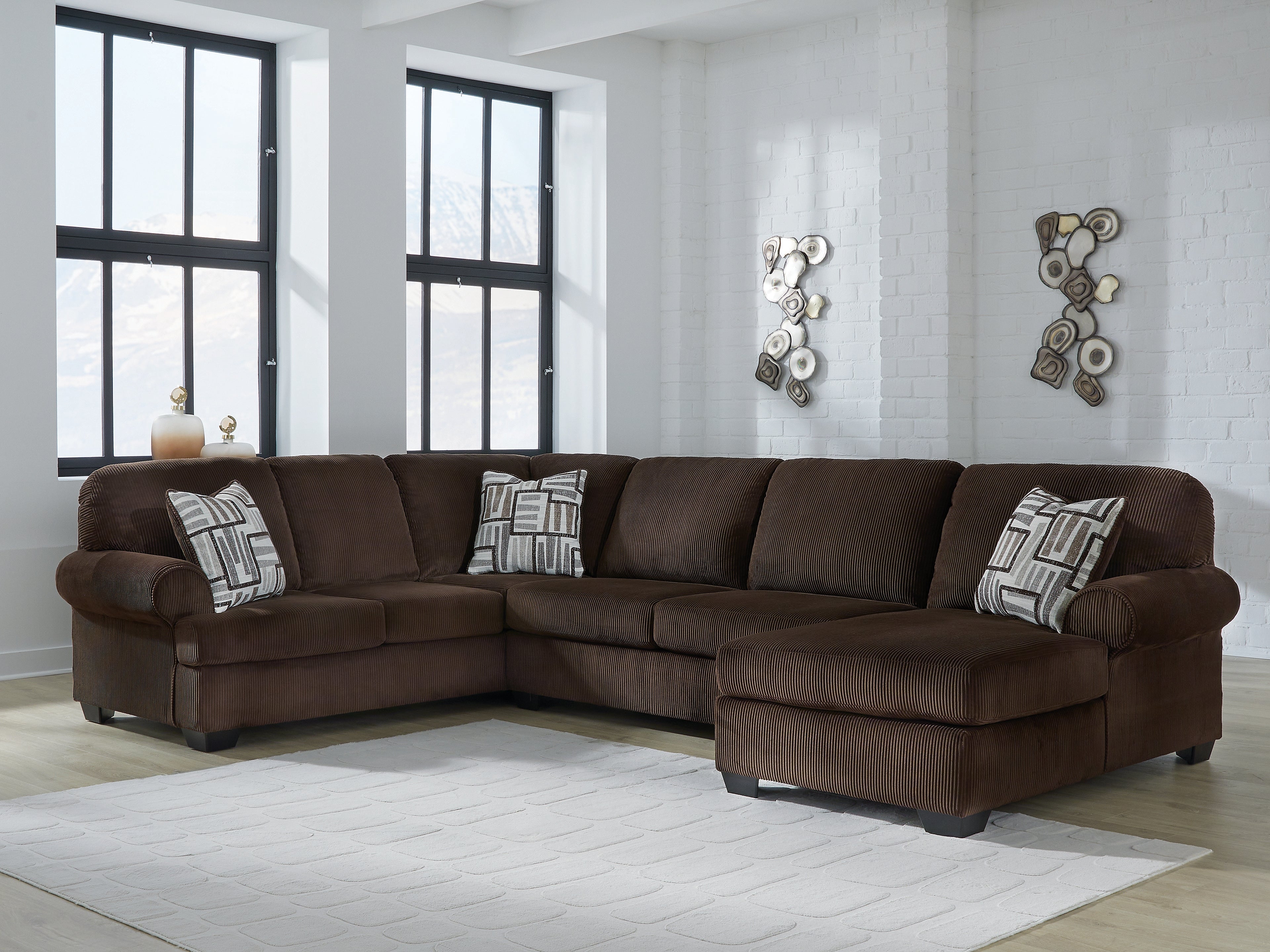 Kimlee Chocolate 3-Piece Sectional with Right Chaise