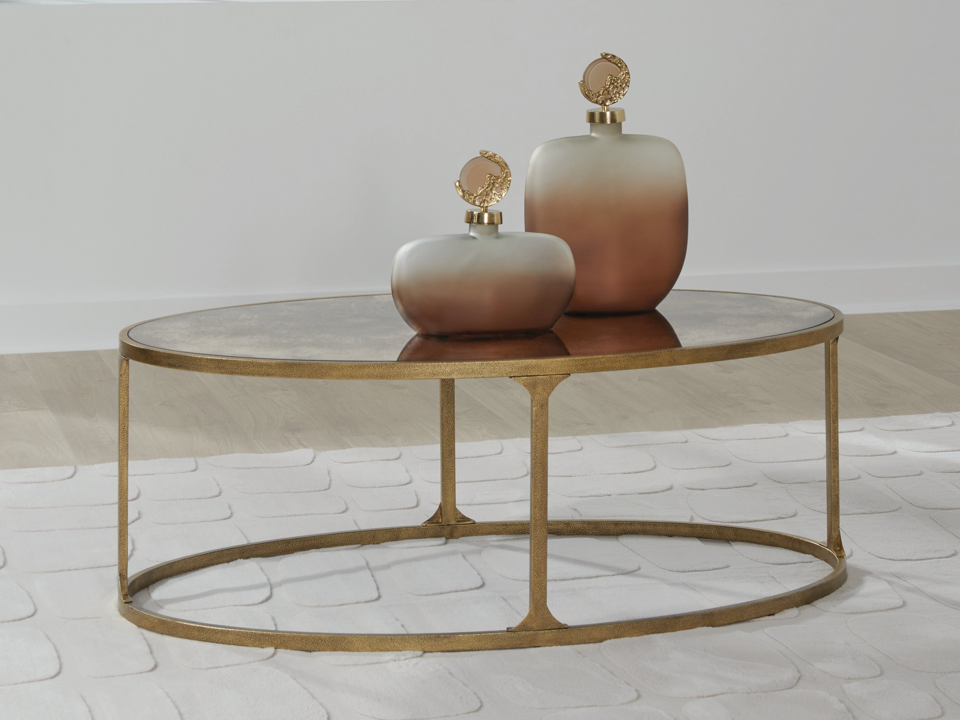 Korajane Antique Gold Oval Cocktail Table