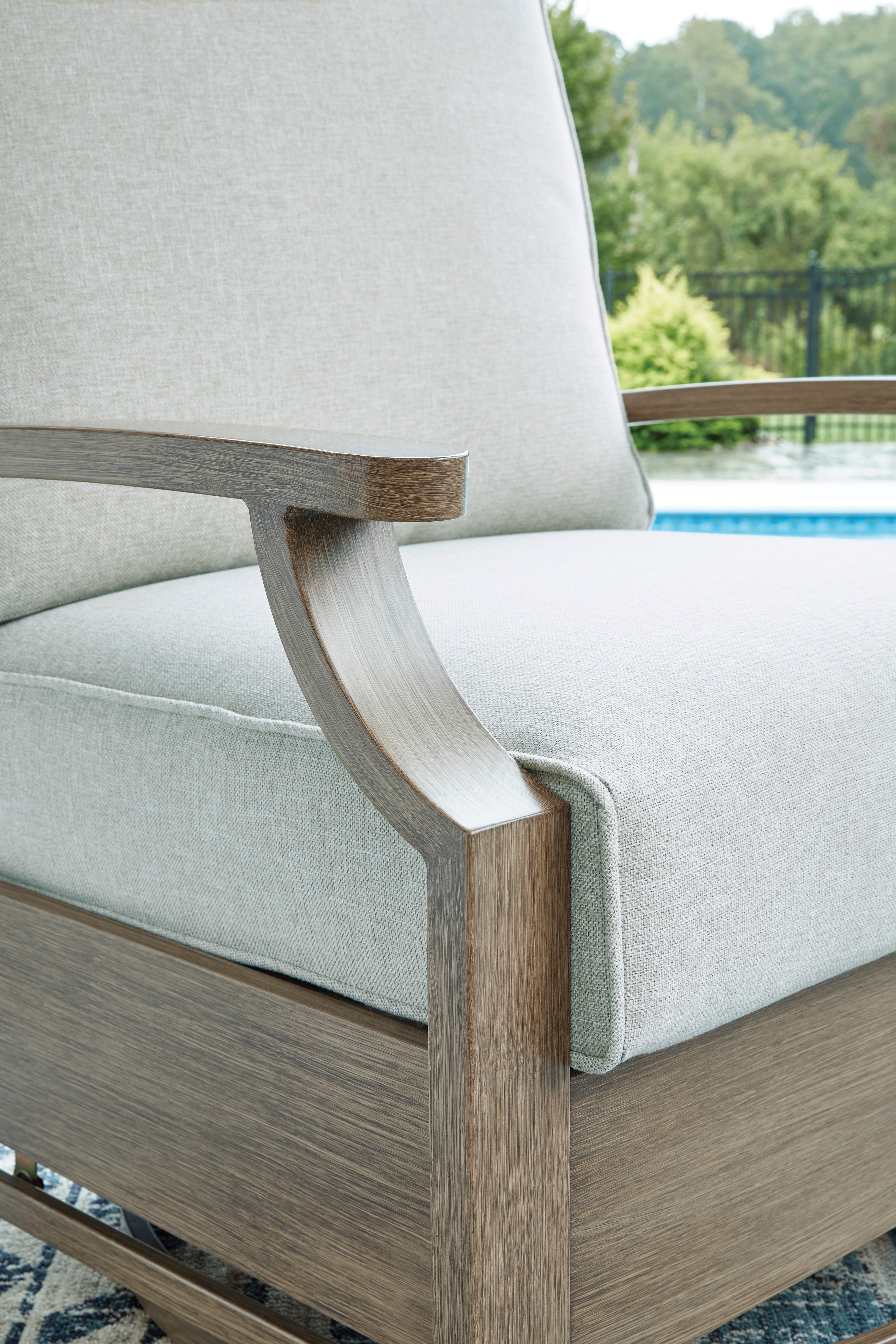 Rainier Ranch Brown/Beige Outdoor Swivel Glider Chair with Cushion