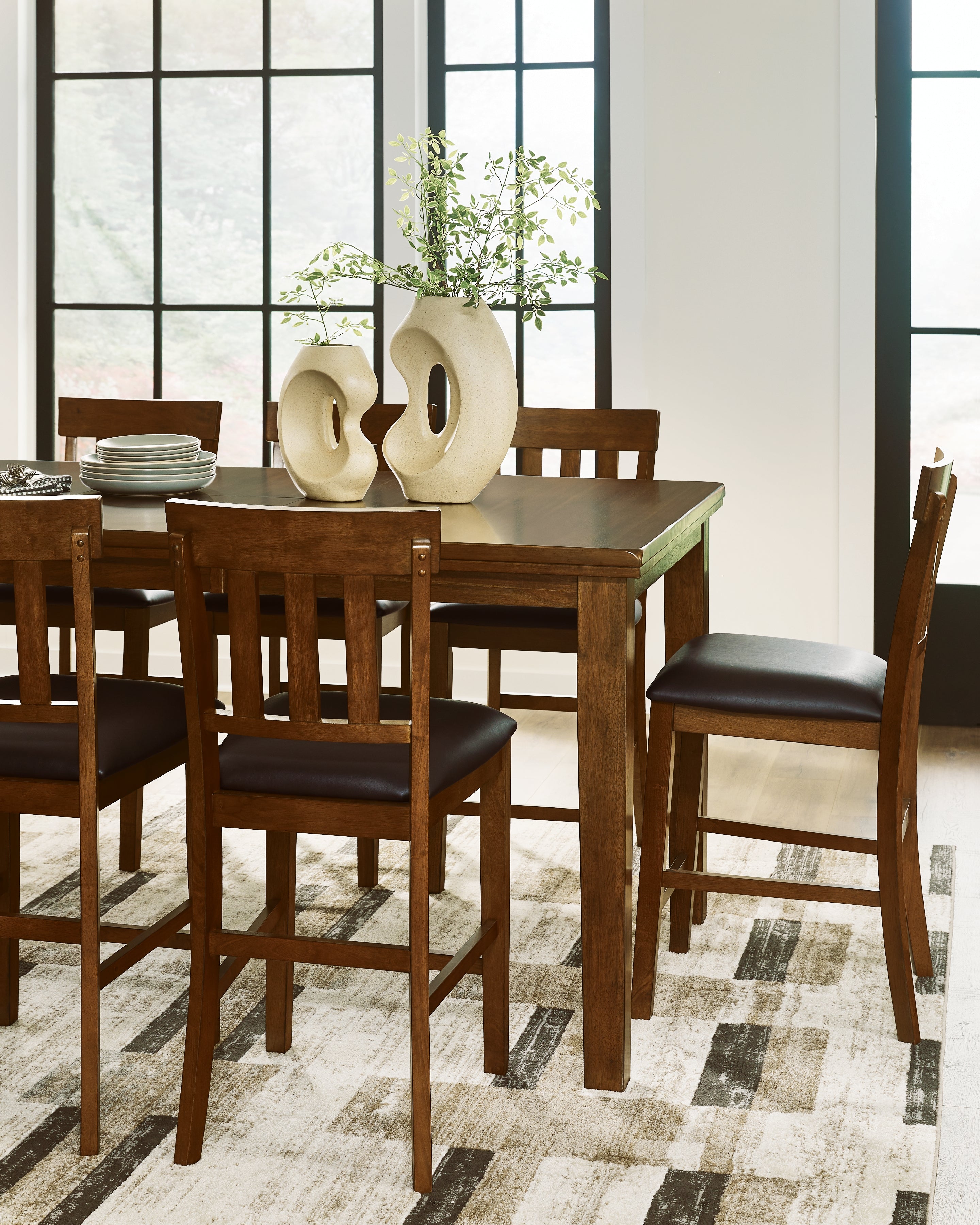 Ralene Medium Brown Counter Height Dining Table and 4 Barstools