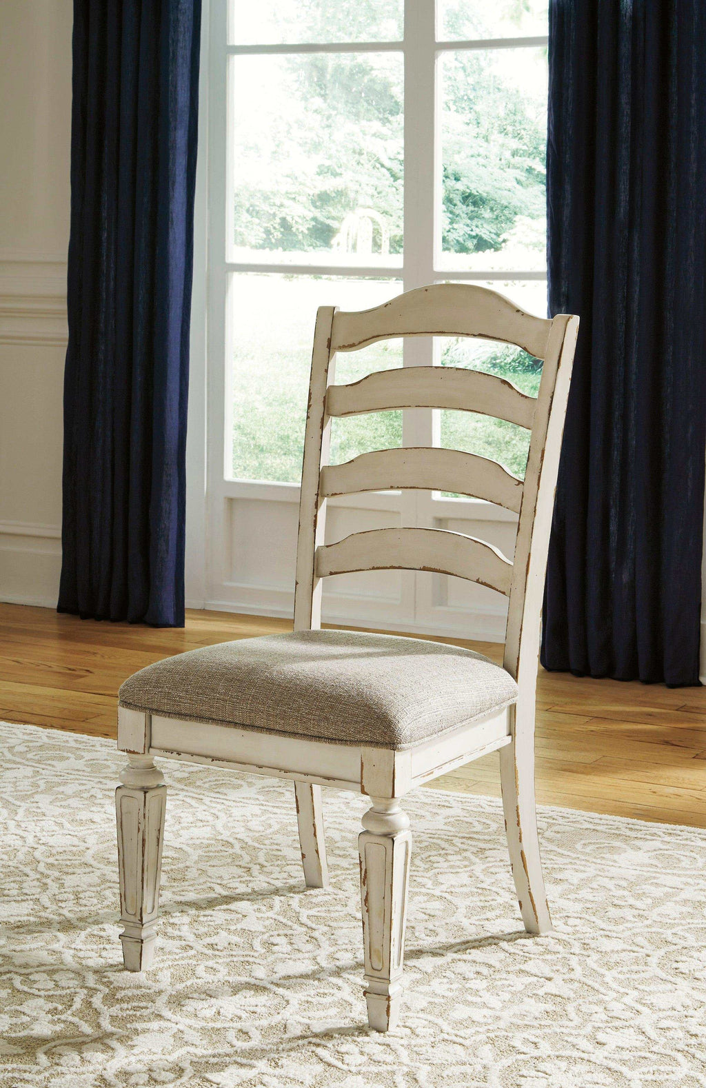 Realyn Chipped White Dining Room Set / 9pc (Ladderback styling)