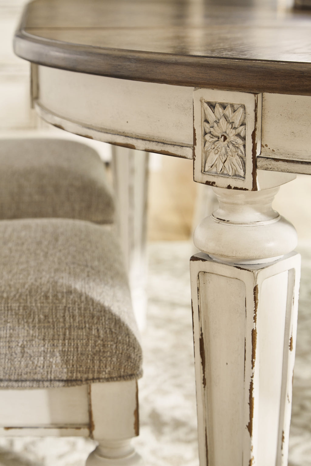 Realyn Chipped White Dining Table and 8 Chairs