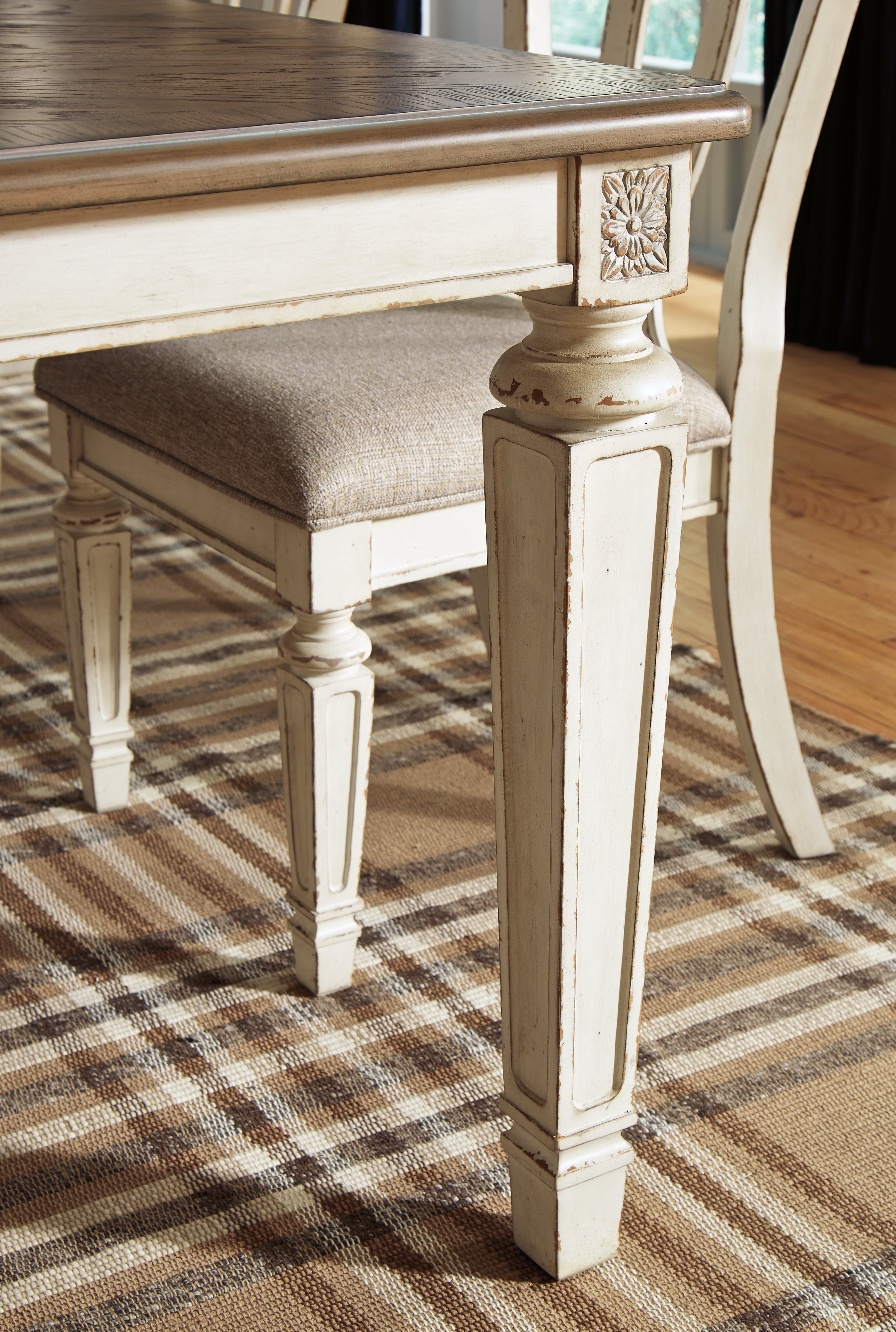 Realyn Chipped White Dining Table and 8 Chairs