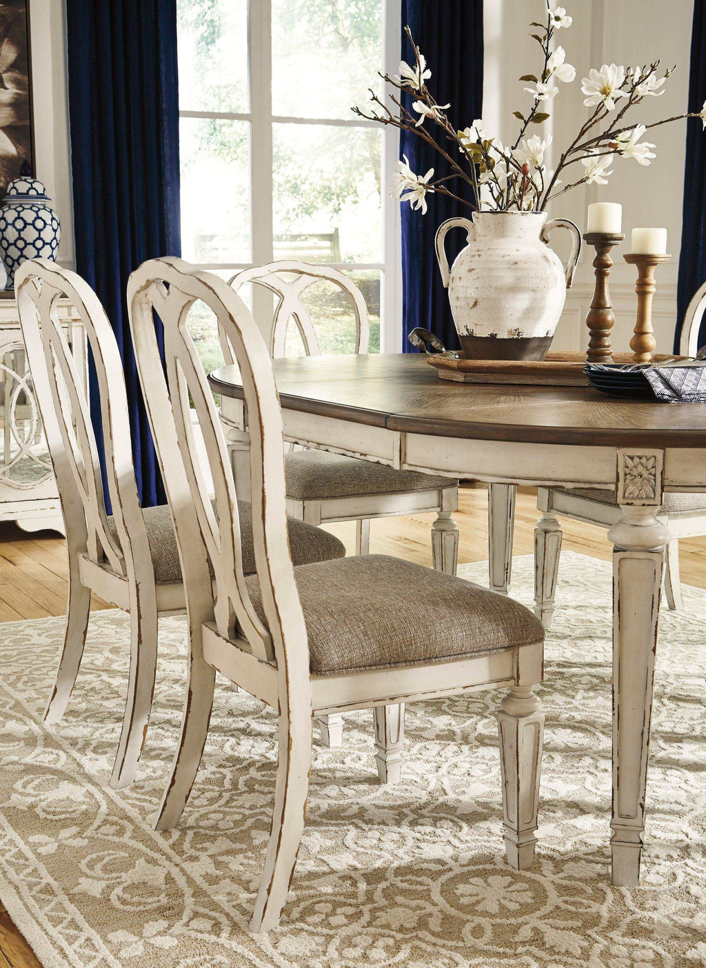 Realyn Chipped White Oval Dining Room Set / 7pc with Ribbon-Back