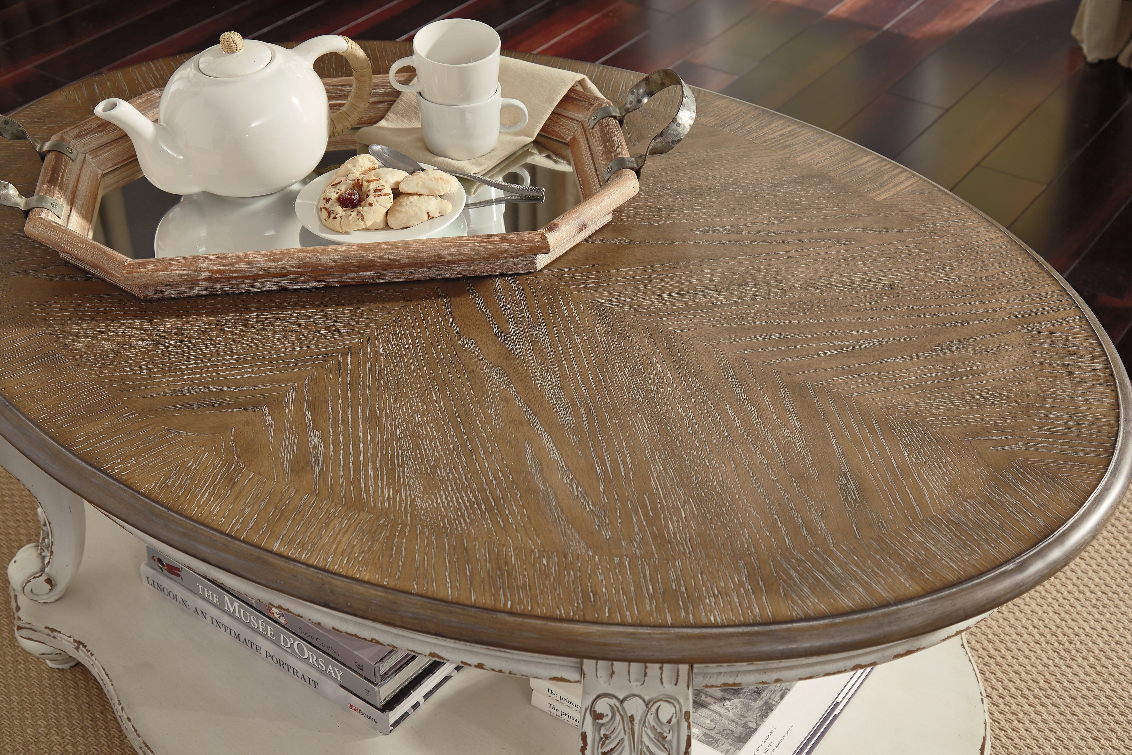 Realyn White/Brown Oval Coffee Table