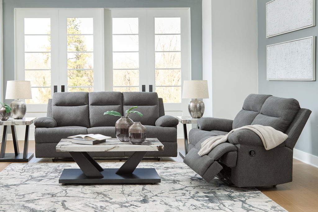 Side-Swipe Charcoal Reclining Sofa and Loveseat