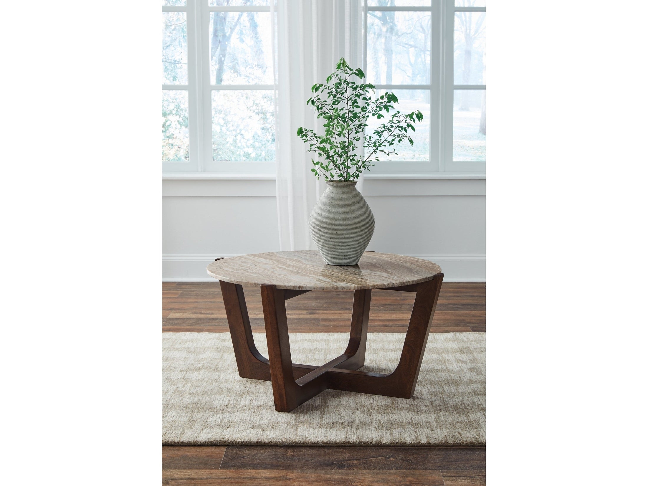 Tanidore Warm Brown Round Cocktail Table