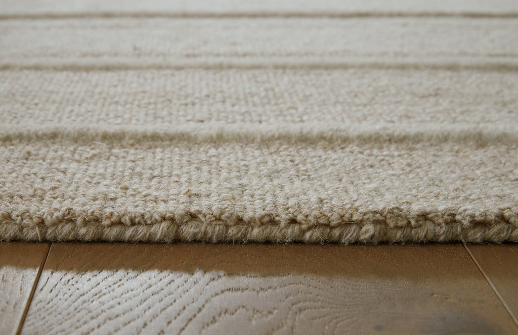 Teelgan Ivory/Tan Extra Large Rug