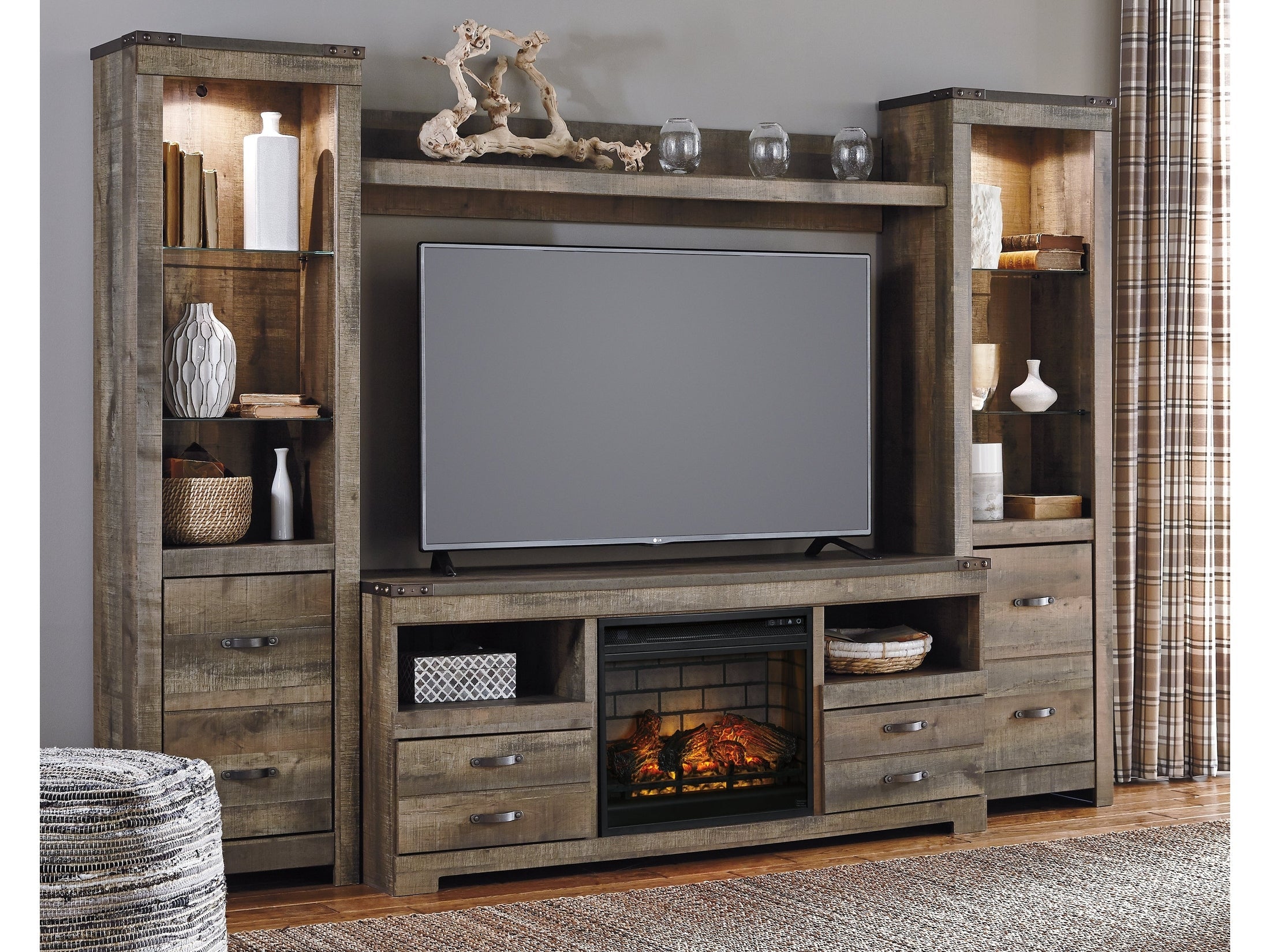 Trinell Brown 4-Piece Entertainment Center with Electric Fireplace