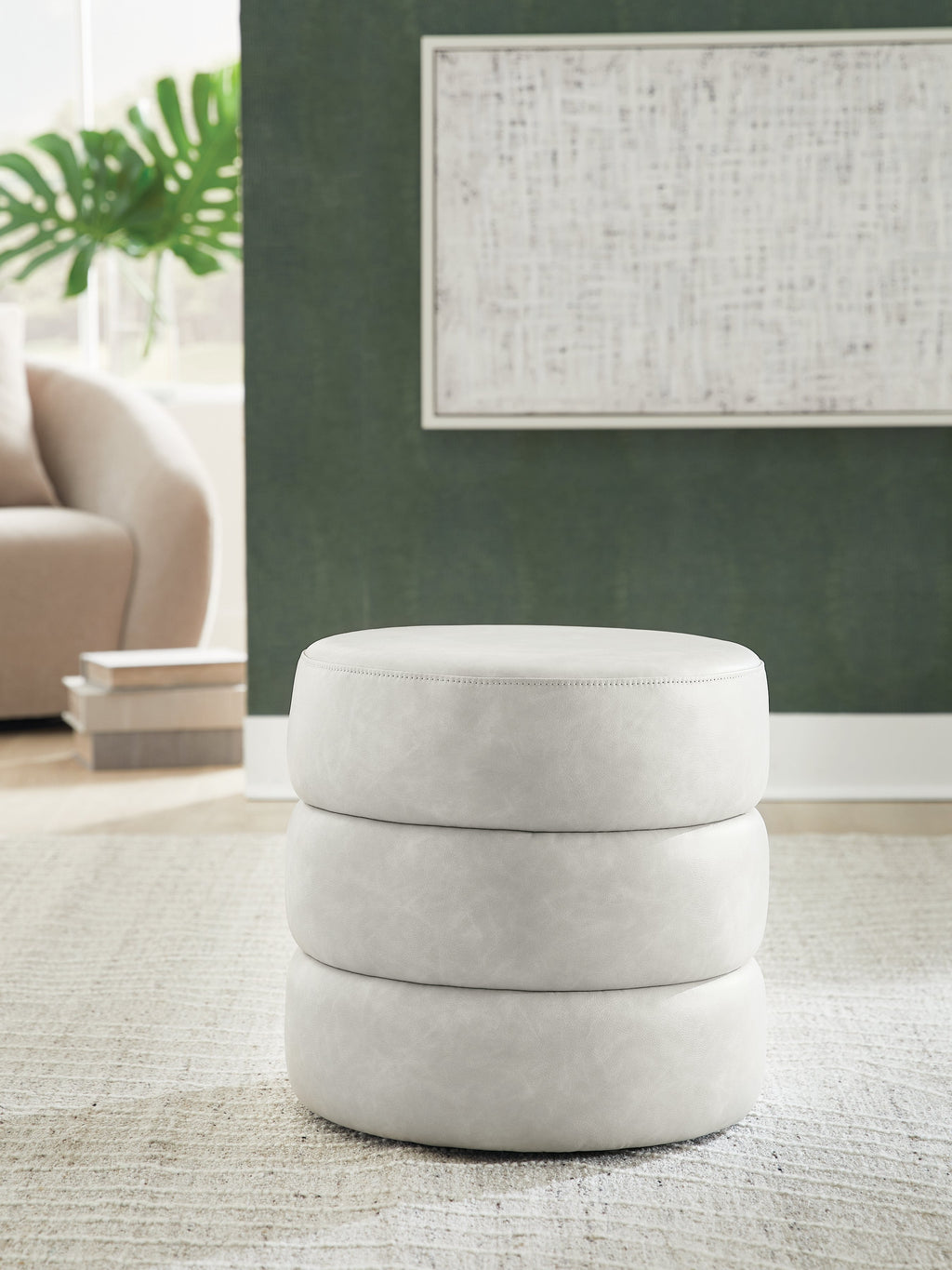 Ummi Bone Swivel Accent Ottoman