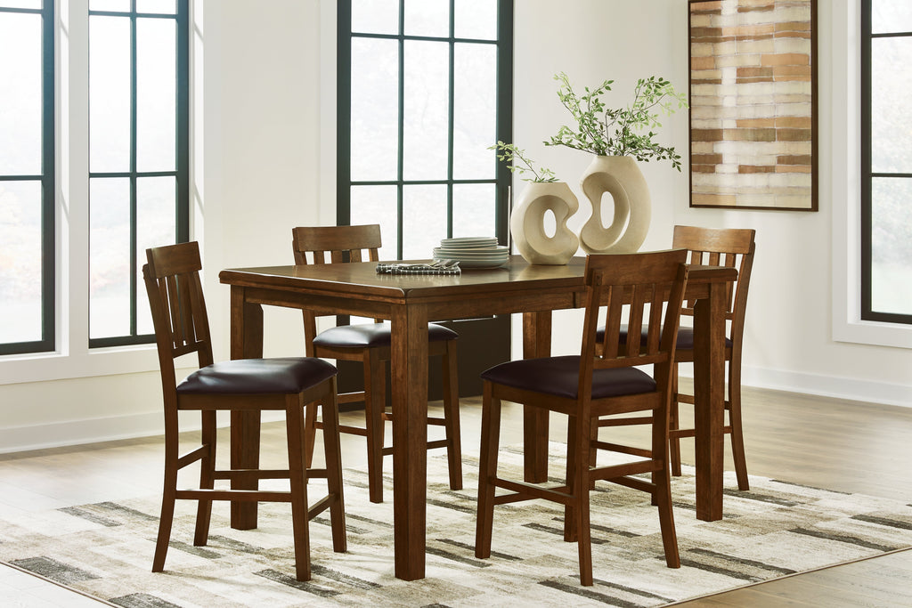 Ralene Medium Brown Counter Height Dining Table and 4 Barstools