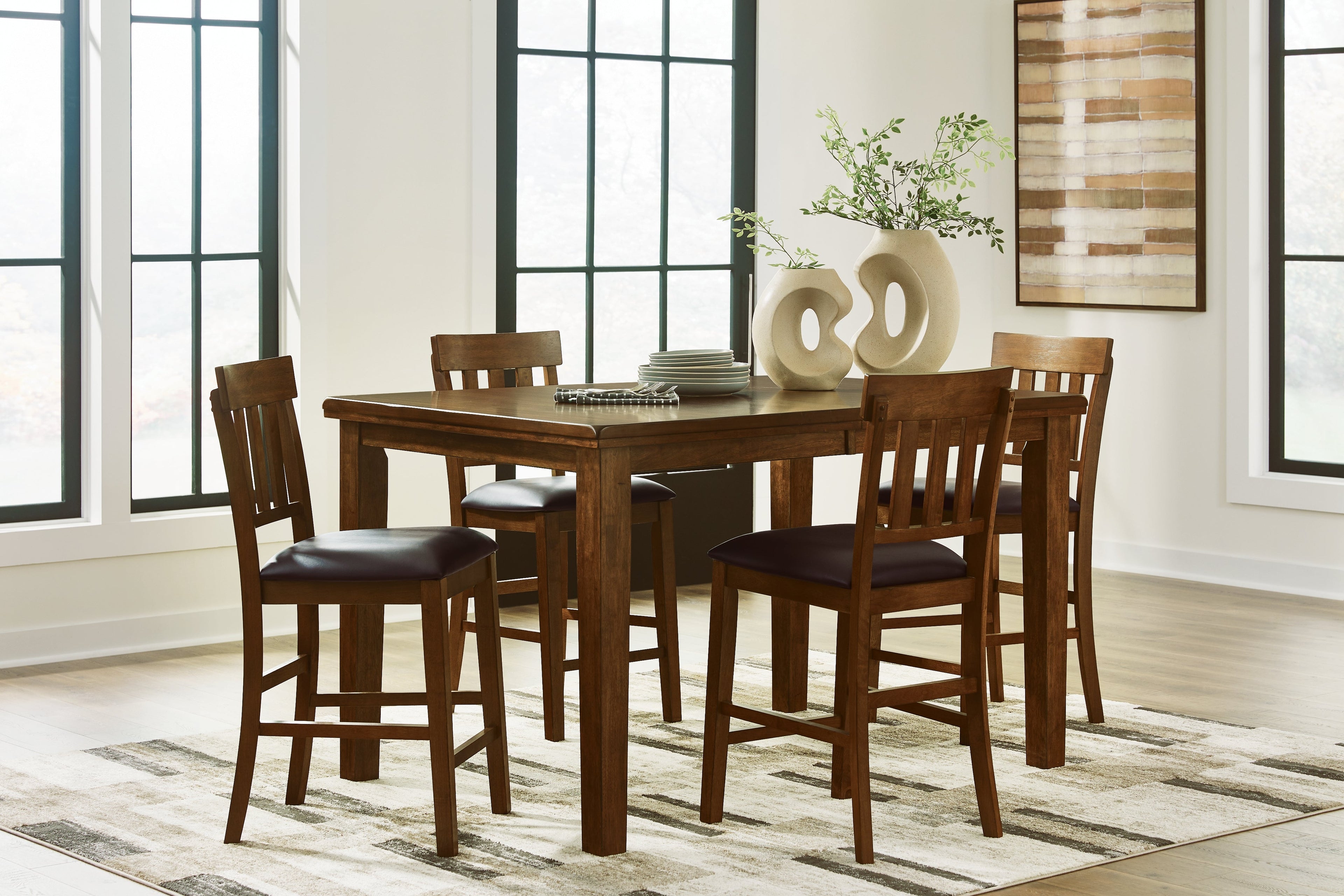 Ralene Medium Brown Counter Height Dining Table and 4 Barstools