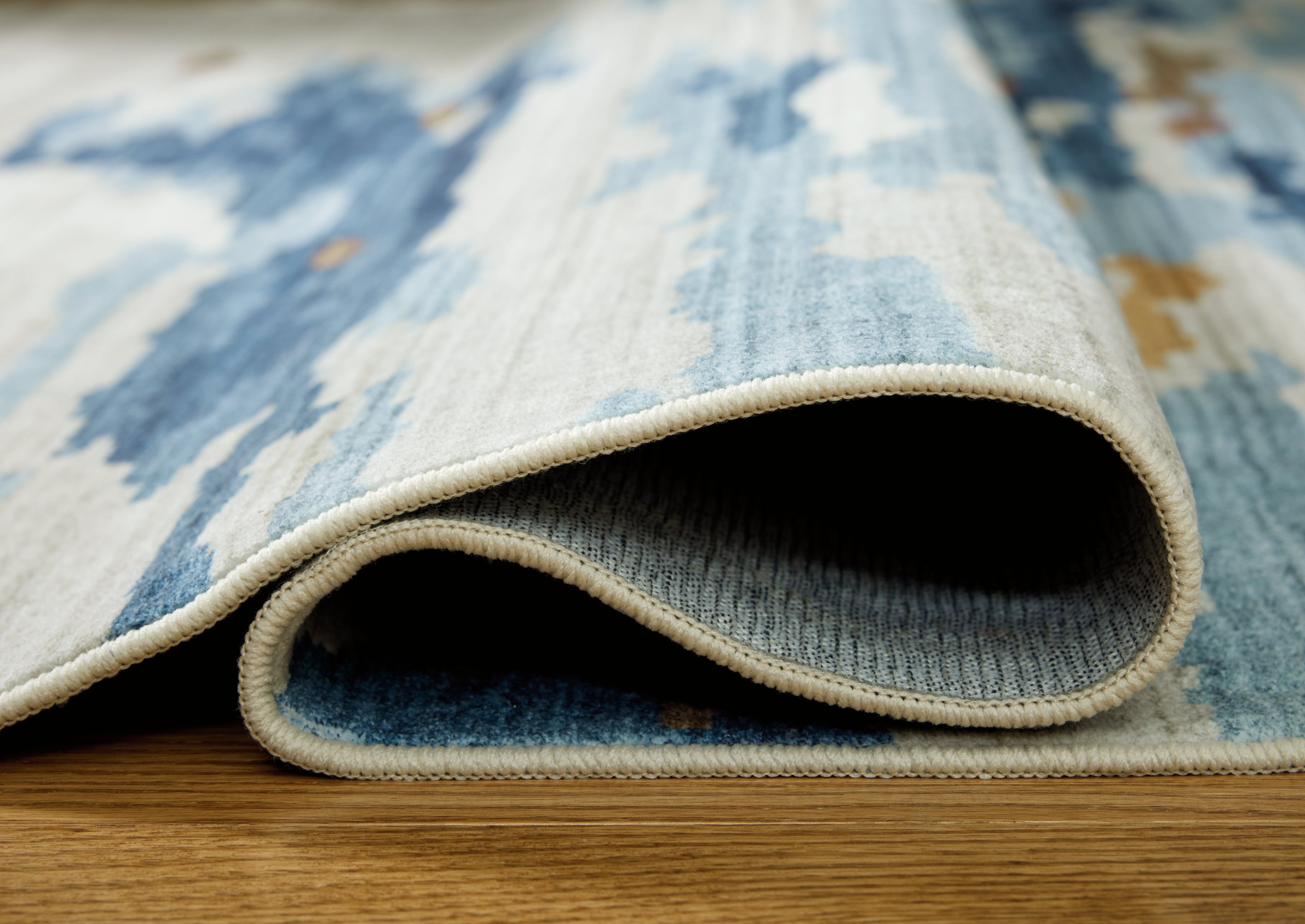 Vinlett Cream/Blue/Brown 5' x 7' Washable Rug